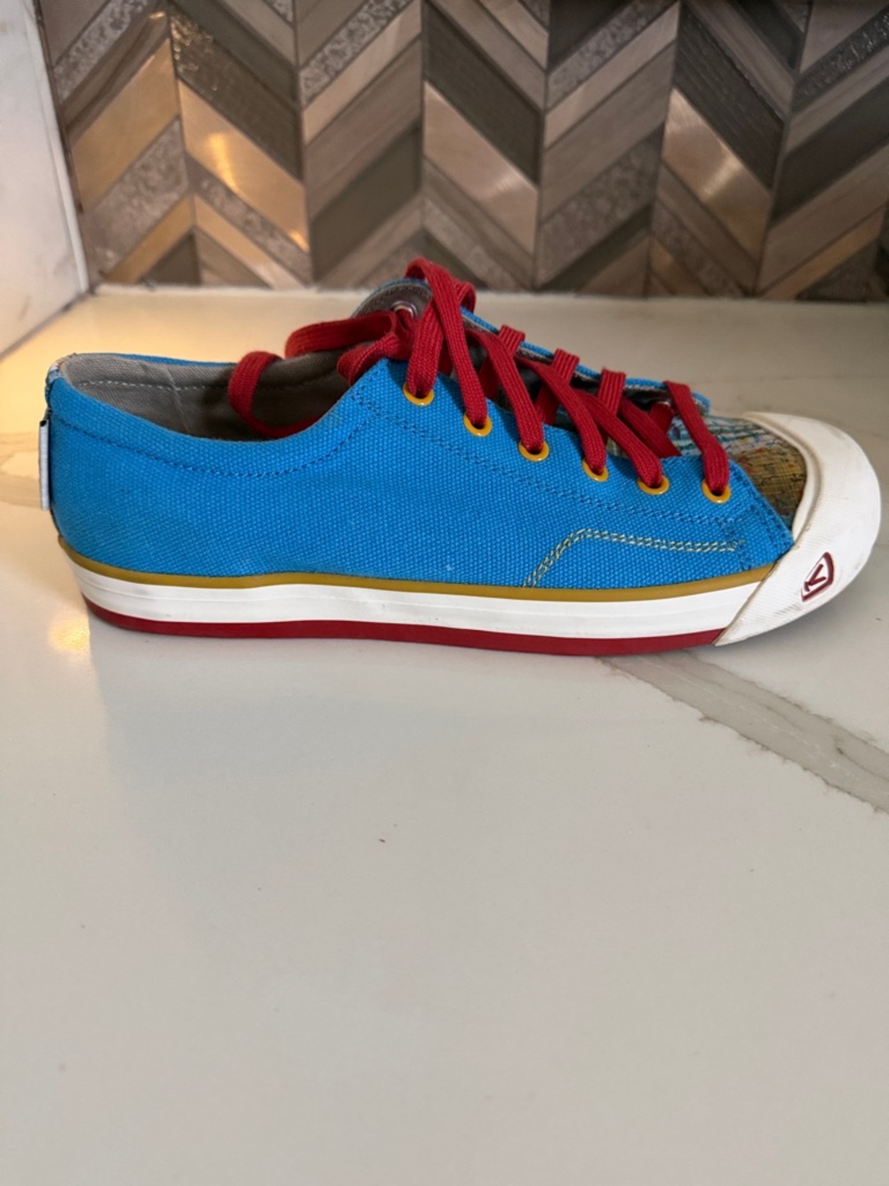 Keen Low-Top Sneakers in Bright Blue with Red Laces